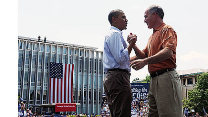 President Obama greets Pennsylvania Senator Bob Casey before speaking to the CMU crowd.