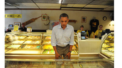 The president examines the bakery cases at Kretchmar's
