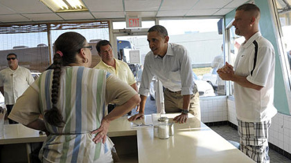 President Barack Obama orders breakfast at Ann's Place in Akron, Ohio this morning.