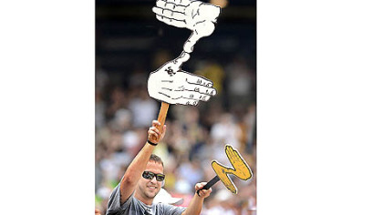 A fan shows support with a Zoltan sign.