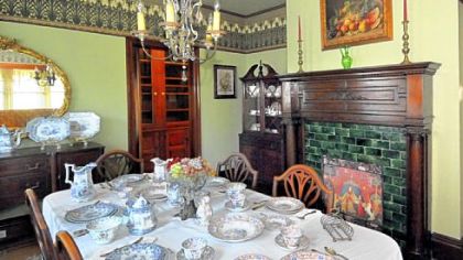 The dining room features an original chandelier.