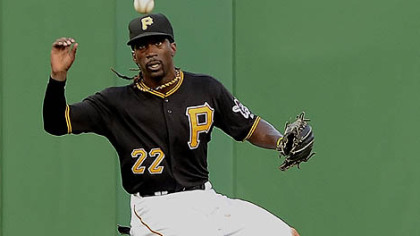 Center fielder Andrew McCutchen runs down a base hit by the Giants' Melky Cabrera Friday night at PNC Park.