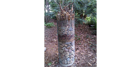 Sticks and stones silos created by Alan London of Mt. Lebanon after seeing similar ones made by Temple University students for the Philadelphia Flower show.