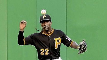 Pirates center fielder Andrew McCutchen runs down hit by the Giants' Melky Cabrera Friday night at PNC Park.