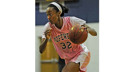 Shatori Walker-Kimbrough drives to the basket in a game earlier this year.