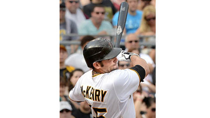 The Pirates' Michael McKenry hits a solo homer of the Giants' Ryan Vogelsong.