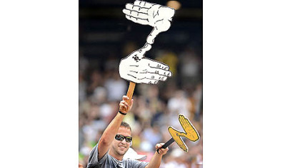 A fan shows support with a Zoltan sign Saturday at PNC Park.