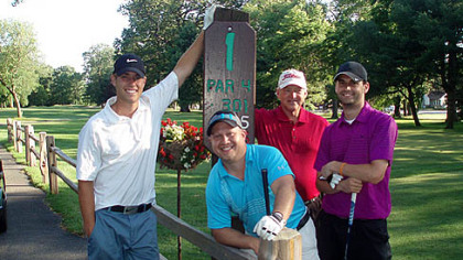 Four local golfers who set a Guinness World Records mark by playing eight 18-hole rounds in one day are, from left, Shane Eichenlaub, Ryan Lombardo, Pat Kern and Shawn Carr.