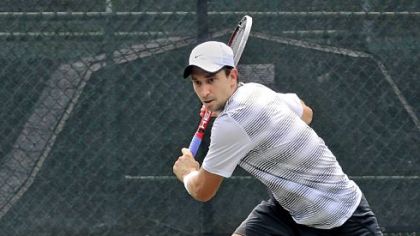 Alex Bogdanovic of Great Britain rushes the net to return a ball hit by Matheson Klein of Australia during the PNC Men's Futures of Pittsburgh tennis tournament at the Mt. Lebanon Tennis Center.