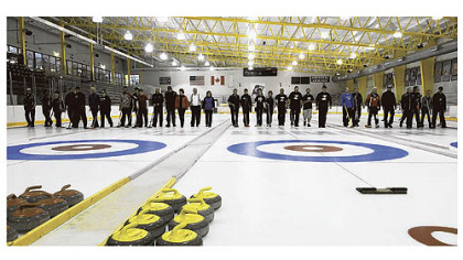The 10 teams that made it to the final round in the curling competition line up before their final matches at the Island Sports Center on Neville Island.