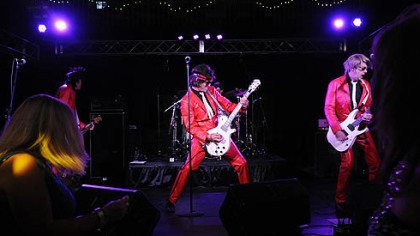 Flash Back Heart Attack rocks the crowd at a Ben Roethlisberger Foundation event Sunday at Jergel's Rhythm Grill in Warrendale.