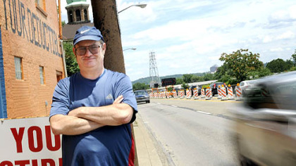 William Lieberth Sr., owner of Allegheny Auto Body, has been at the same location on East Ohio Street since 1976. PennDOT says he must move his shop by Aug. 6.