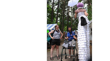 Karen Gesalman, left, of Greensburg and Bonnie Altman, center, of Pleasant-Unity meet Donna Penoyer, aka Mimi, of Lawrenceville at the Westmoreland County Arts and Heritage Festival at Twin Lakes Park in Hempfield on Saturday.