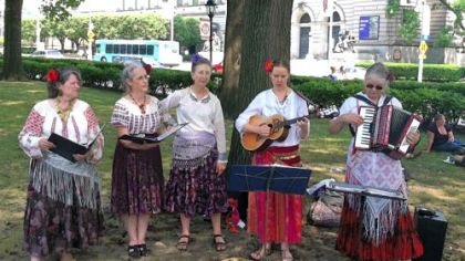 A band provides entertainment for students and faculty of the Summer Language Institute during their afternoon picnic.
