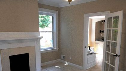 The master bedroom has a fireplace and an en suite master bathroom.