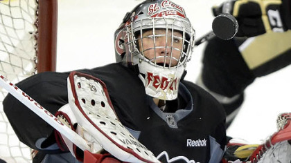 Goaltender Ryan Faragher concentrates on the puck during a scrimmage Saturday at Consol Energy Center.