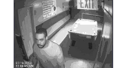 A surveillance photo of an unknown man who accompanied Antwon Underwood to the Earl the Pearl bar. He was last seen running with a firearm after a man on the 7200 block of Kelly Street in Homewood.