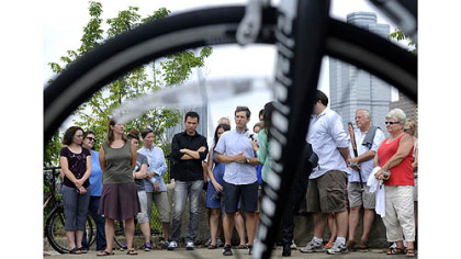 Scott Bricker, executive director for Bike Pittsburgh, addresses a crowd at the Three Rivers Heritage Trail.