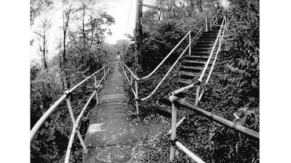 The intersection of the Frazier and Romeo steps in Oakland. Note the street sign faintly visible at the center top of the photo. From the book "The Steps of Pittsburgh"
