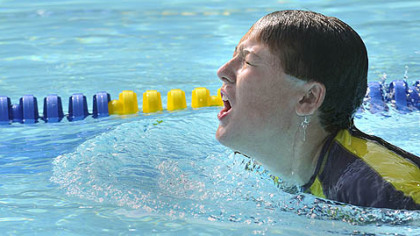 Colin Daley, 12, comes up to grab a breath while doing the breast stroke the length of the Mt. Lebanon Recreation Center pool.