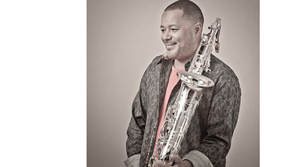 Najee's early musical influences came courtesy of his mother.
