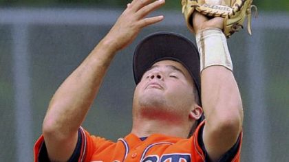 East Hempfield's Brad Appleby pulls in a fly ball against West Hempfield in American Legion action July 11.