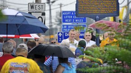 Rain did not stop a large turnout Sunday for the dedication ceremony to unveil the State Historical Marker commemorating the former Heidelberg Raceway and Sports Arena.