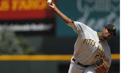 Pirates starting pitcher James McDonald delivers to Colorado Rockies batter Tyler Colvin in the first inning of Wednesday's game in Denver.