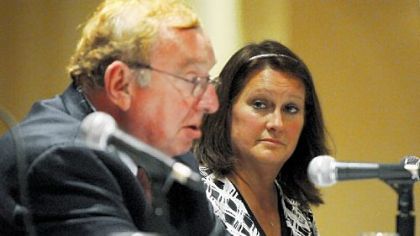 Louis D. D'Amico, director of the Pennsylvania Independent Oil and Gas Association, speaks after the showing of "Truthland." Shelly Depue, right, appeared in the film.