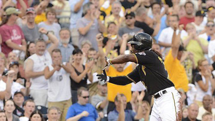 Andrew McCutchen makes the sign of Zoltan after hitting triple.