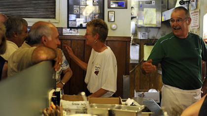 Tom (top, right) and Gail Weisbecker (top, center) have owned and operated this Isaly's store since 1998. They are selling the store and retiring. The new owners plan to keep the entire menu but change the name. It is one of the few Isaly's stores left in the area.