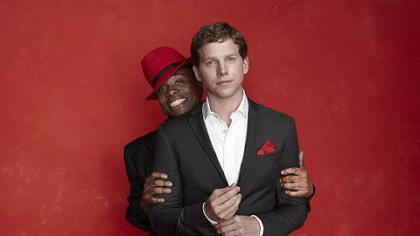 Billy Porter peeks over the shoulder of his "Kinky Boots" co-star Stark Sands. They open the new Harvey Fierstein-Cyndi Lauper musical Oct. 2 in Chicago as a pre-Broadway run.