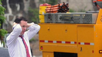 Pittsburgh Mayor Luke Ravenstahl checks on the cleanup operations in Hays.