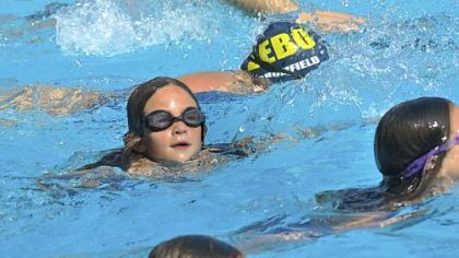 Erin Smolenski, 9, of the Piranhas Summer Swim Team at Mt. Lebanon Recreation Center, participates in a freestyle swim on Monday.