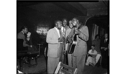Four musicians perform at the Local 471 Musicians Club on Wylie Avenue in the Hill District, circa 1940-1950.