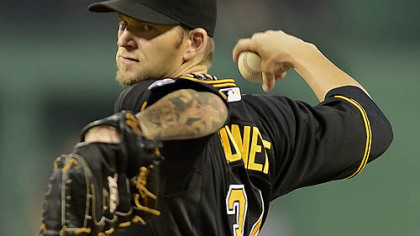 Pirates starter A.J. Burnett delivers against the Miami Marlins.