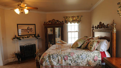 A focal point of the master bedroom is the fireplace.