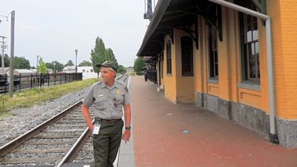 Gettysburg National Military Park historian John Heiser stands outside the Gettysburg Train Station.