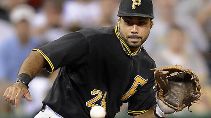 Pirates third baseman Pedro Alvarez makes play on a ball hit by the Marlins' Carlos Lee.