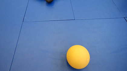 Delwayne Joseph Delaney, a runner from Saint Kitts and Nevis, stretches during his workout at the Athletes' Village at the Olympic Park, Sunday, July 22, 2012, in London.