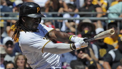 Pirates centerfielder Andrew McCutchen gets a hit in the sixth inning against the Cubs this afternoon at PNC Park.