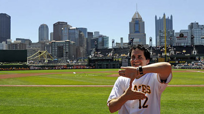 Hal Sparks, the actor who played Zoltan in "Dude Where's My Car," gives the Zoltan sign to fans before the start of the game against the Cubs today. Sparks threw out the first pitch.