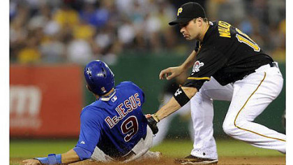 Cubs' David DeJesus gets into second base safely as Pirates' Neil Walker applies the tag in the seventh inning at PNC Park Tuesday night.