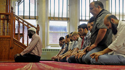 An afternoon prayer is led by Imam Abdusemih Tadese, left, at the Islamic Center of Pittsburgh in Oakland on July 18 ahead of Ramadan, which began Friday.