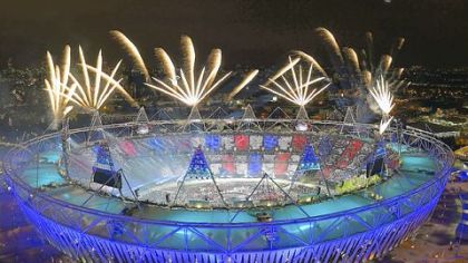 Fireworks illuminate the sky over Olympic Stadium during Opening Ceremonies at the 2012 Summer Olympics, Saturday, July 28, 2012, in London.