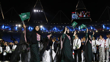 Saudi Arabia's athletes parade during the Opening Ceremony at the 2012 Summer Olympics, Friday, July 27, 2012, in London.