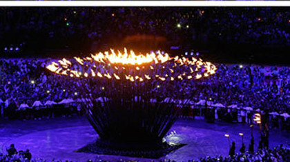 This series of photos shows the Olympic flame as it is lit during the Opening Ceremony at the 2012 Summer Olympics, Saturday, July 28, 2012, in London.