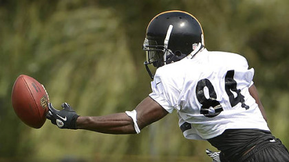 Steelers wide receiver Antonio Brown ends up making catch during training camp in Latrobe Pa.