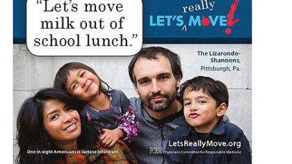 Billboard showing Stanton Heights resident Leah Lizarondo-Shannon, her husband Bill Shannon and their two children saying "Let's move milk out of school lunch."