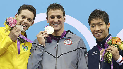 Brazil's Thiago Pereira, United States' Ryan Lochte and Japan's Kosuke Hagino pose with their medals for the men's 400-meter individual medley swimming final. Lochte won gold, Pereira silver and Kosuke bronze.